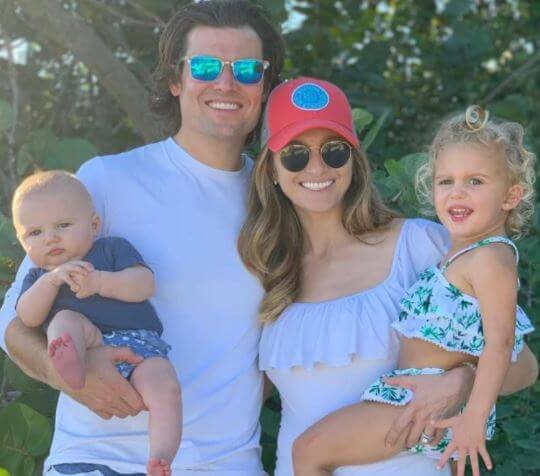 Erica Rakow with her husband, Scott Reynolds, and children.